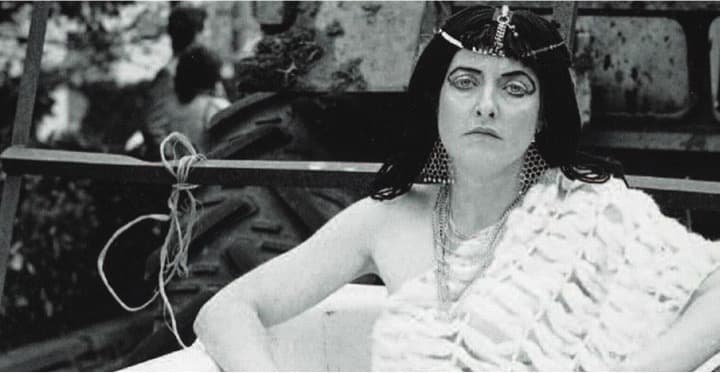 Half naked woman in a bathtub making Welsh cheese win